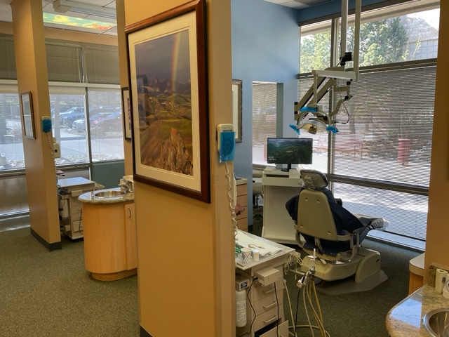 Office hallway and operatories at {PRACTICE_NAME}