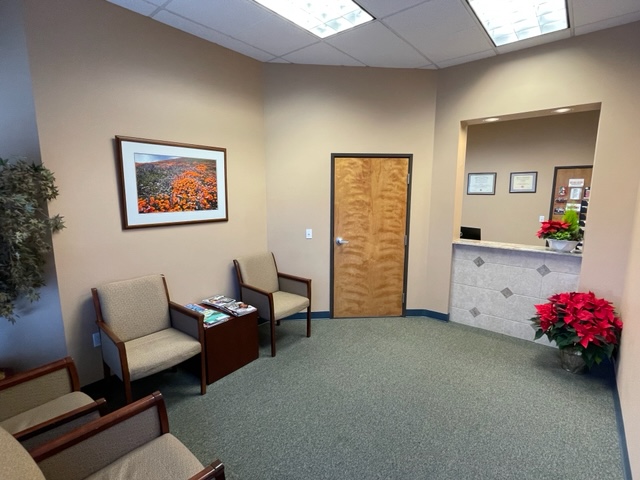 Office reception area at {PRACTICE_NAME}